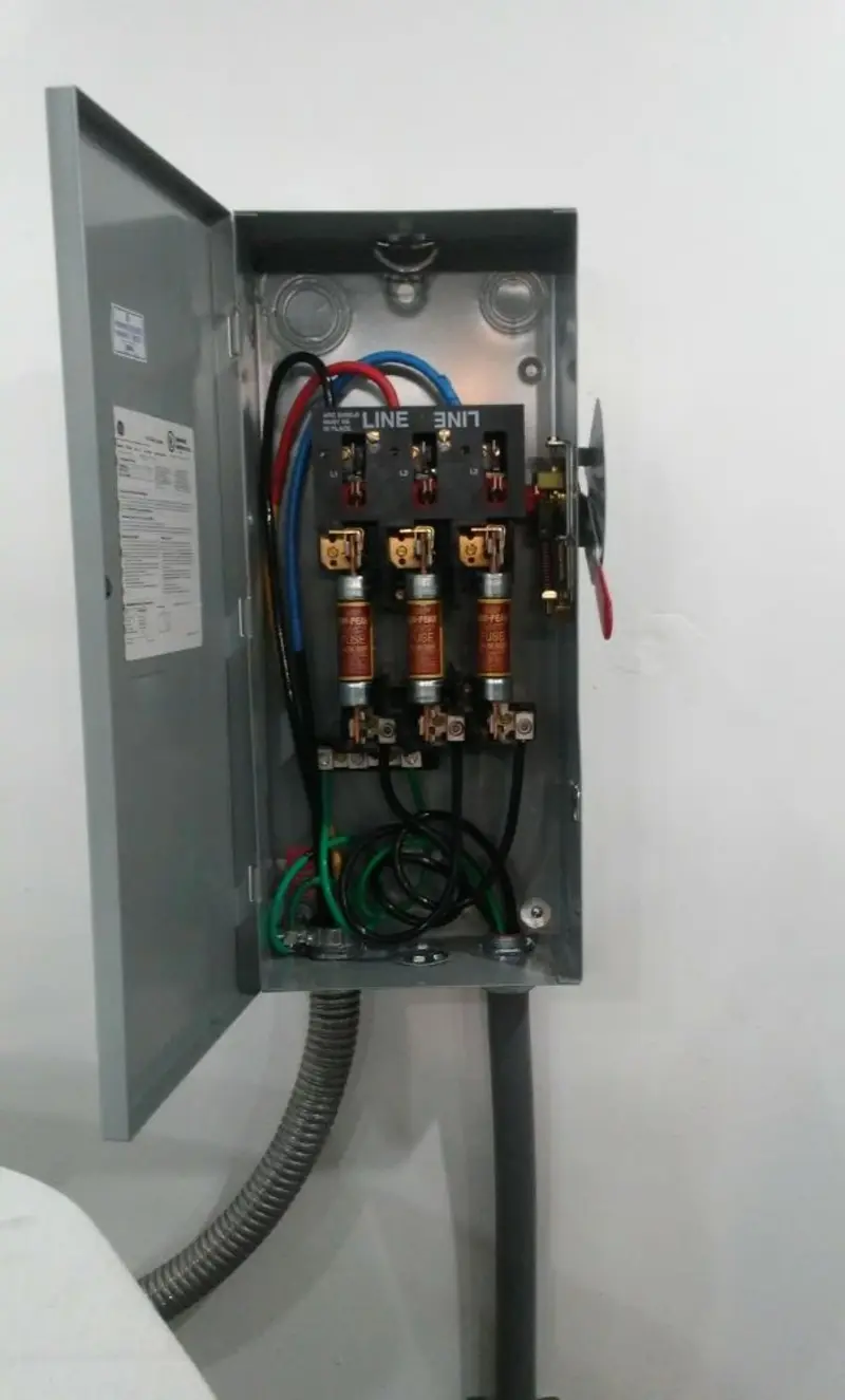 Three-phase disconnect switch installed for Smoke Detector Installation in Baytown