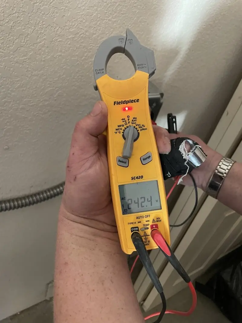 Voltage testing with clamp meter during Aluminum Wiring Replacement in Baytown
